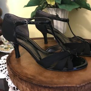 Naturalized black patent heels